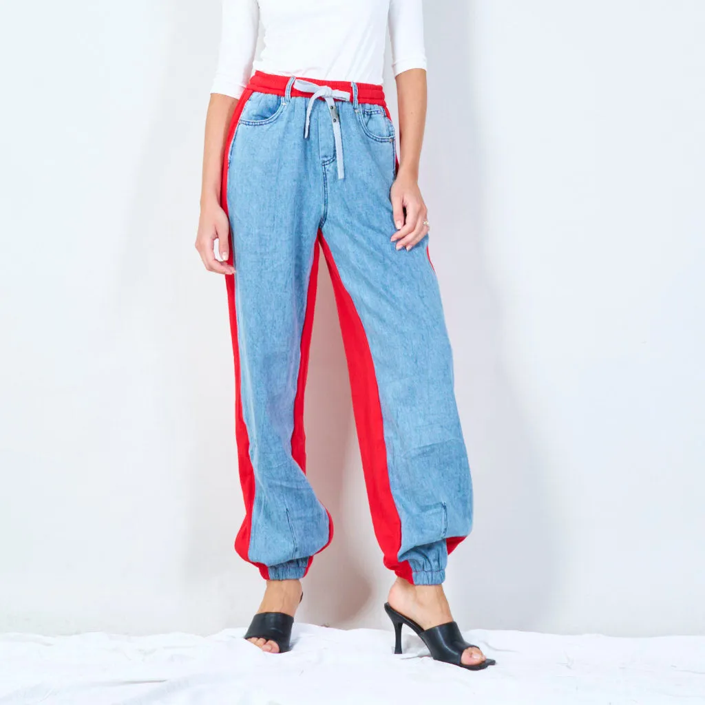 Casual denim jogger pants with contrast panels wholesale